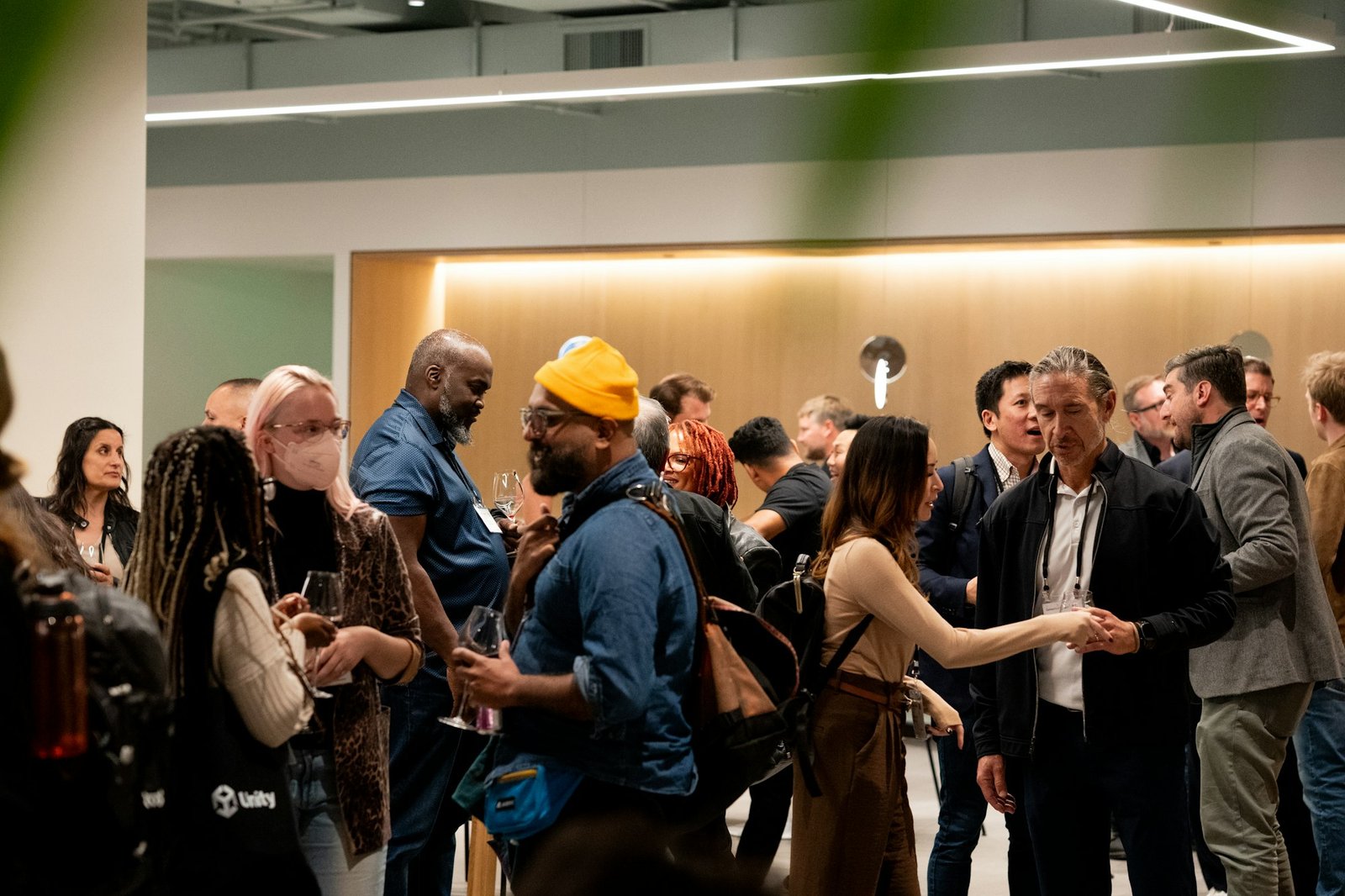 People networking at an indoor business event